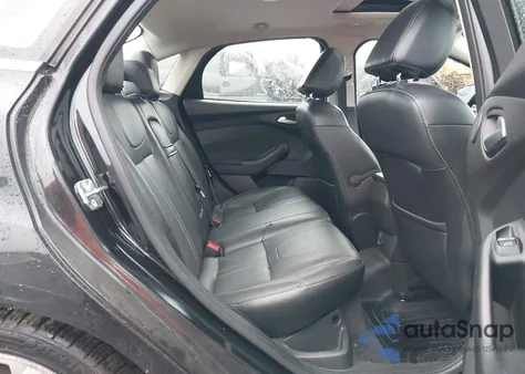 2012 Ford Focus Titanium z USA, uszkodzony, nr VIN 1FAHP3J29CL384353